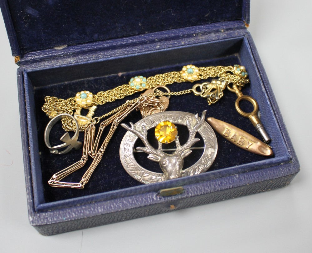 A 9ct gatelink bracelet, a simulated turquoise costume bracelet, a Scottish silver brooch etc.